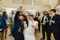 Newlyweds dancing at a wedding reception 