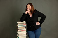 LinkedIn-ready professional headshot of a Northville business owner, showcasing confidence and professionalism in a studio setting.