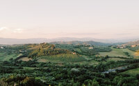 Sunset over rolling hills in the Italian countryside
