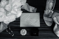 Wedding invitation and floral flatlay detail shot captured in San Antonio.