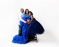 Family maternity session with mom in blue gown in brooklyn studio