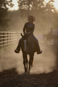 Lady at sunset at Good Old Days horse show