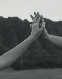 Holding Hands in Oahu on our honeymoon. Taken by Valerphotos.