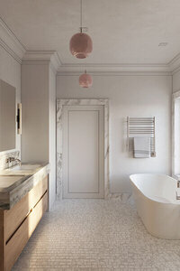 A Boston brownstone renovation features a primary bathroom with an oak vanity, freestanding tub, and marble stone trim, designed by top Boston interior designers.