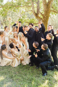Full Wedding Party Fun Portrait | Photography by Jocelyn