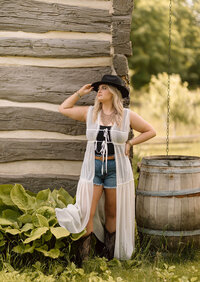 Laura Duflo during her brand shoot for Boho Glow Studio in Mankato, MN, offering makeup artistry and hand-sprayed tanning.