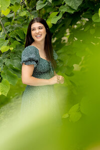 Stylish senior portrait session for a high school student in Ann Arbor, taken at a local park with soft natural light.