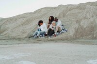 family sitting posing