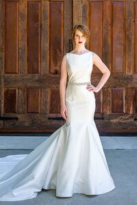 strapless mermaid wedding dress with a petal hem