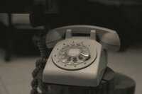 A dial telephone, representing the discovery call step in the process of booking Perfect Thirds & Co for Boise wedding planning.