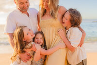 empowering maui portrait of woman wearing sand kasia kulenty gown posing with finger on chin