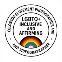 Circular badge with black text reading “Colorado Elopement Photographer and Videographer” around the outer ring and “LGBTQ+ Inclusive and Affirming” in the center, featuring a rainbow with added brown, black, light blue, and pink stripes to represent the Progress Pride flag.