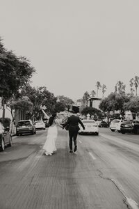 Close up of bride and grooms hands