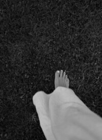 Barefoot walk in the grass, symbolizing grounding and spiritual connection for intuitive healing.