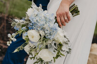 Hand of Pittsburgh bride holding bouquet 