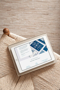 Aubre holding color swatches and smiling