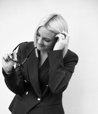 Black and white headshot of Kerry Curl, UK mentor for bridal hair and makeup artists