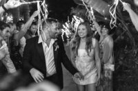 groom hugging bride from behind