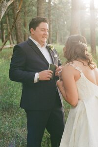 Golden hour vow exchange captured on film photography at The Pines by Wedgewood Weddings