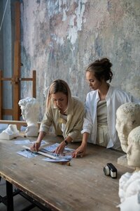 woman working together at a table