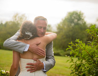 Photo of Father and daughter at her wedding