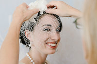 Bride getting her veil on