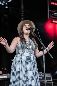 Mikaela Kahn live wedding vocalist performing live music on a stage