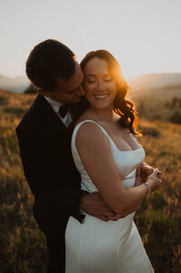 Bride and groom during sunset at intimate Boulder wedding. Colorado elopement.