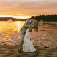 Bride and groom portraits at the dock of Roche Harbor. The photo was taken during sunset.