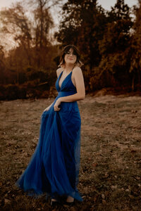 Family/Senior photography near Dayton TX - teenage daughter in blue dress during outdoor golden hour session