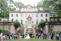Luxury wedding photographer Rebecca Cerasani photographs bride and groom with the Atlanta Skyline.