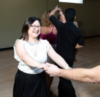 Couples learning Latin and Salsa Dancing during a Dance Practice Party at Dancers Studio.