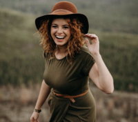 smiling woman with hat