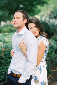 Couple embracing at their engagement session at Rittenhouse Square in Philadelphia, PA