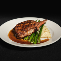 Berkshire pork chop with honey bourbon glaze Max Dales Steak and Chop House Restaurant