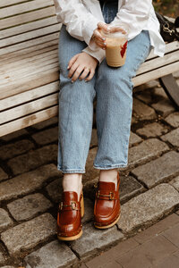 This is a picture of Lydon (web designer) sitting on a park bench in Rittenhouse Square in Philadelphia