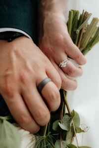 Editorial wedding portraits of bride and groom wedding bands in Fryeburg, Maine.