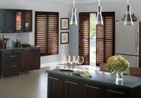 Dark wooden shutters in a modern kitchen