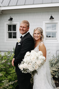 wedding flowers, white wedding flowers, white roses wedding, babys breath wedding, bride and groom, mankato minnesota weddingm southern mn barn wedding, the barn at ballard creek, country wedding minnesota, cows at wedding, wedding venue with cows