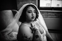 Bridal boudoir photo featuring delicate details in a Minneapolis setting