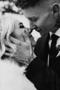 photo of bride and groom embracing taken by Mountain elopement photographer colorado