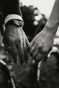 Hands holding flowers
