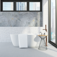 White clawfoot tub with grey wall