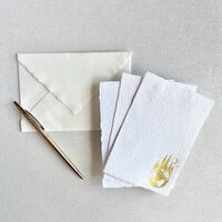 Handmade stationery with gold foil earth