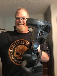 Close-up image of John Hay, a patient of Lethbridge Orthotics, who uses a knee brace.