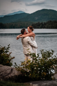 couple looking at eachother after getting married in lake placid ny 
