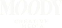 ALT: Moody Creative Media's primary logo in a powder blue color