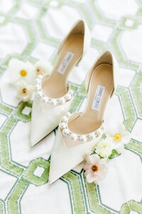 Jimmy choo wedding shoes on a green patterned linen