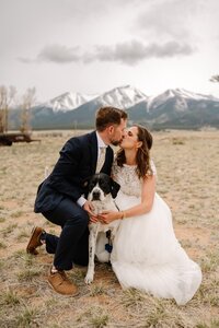 Bride and groom with dog