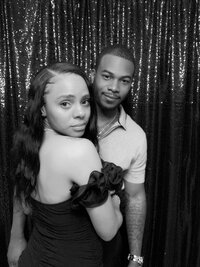 glam photo booth image in black and white of a couple at a wedding